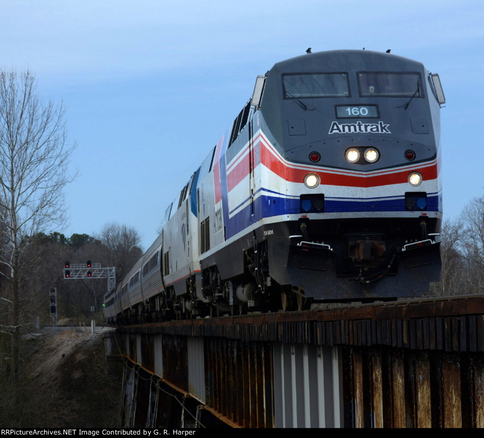 Pepsi can AMTK 160 leads Amtrak #20(20) across Fishing Creek trestle, aka, Campbell Ave. trestle.